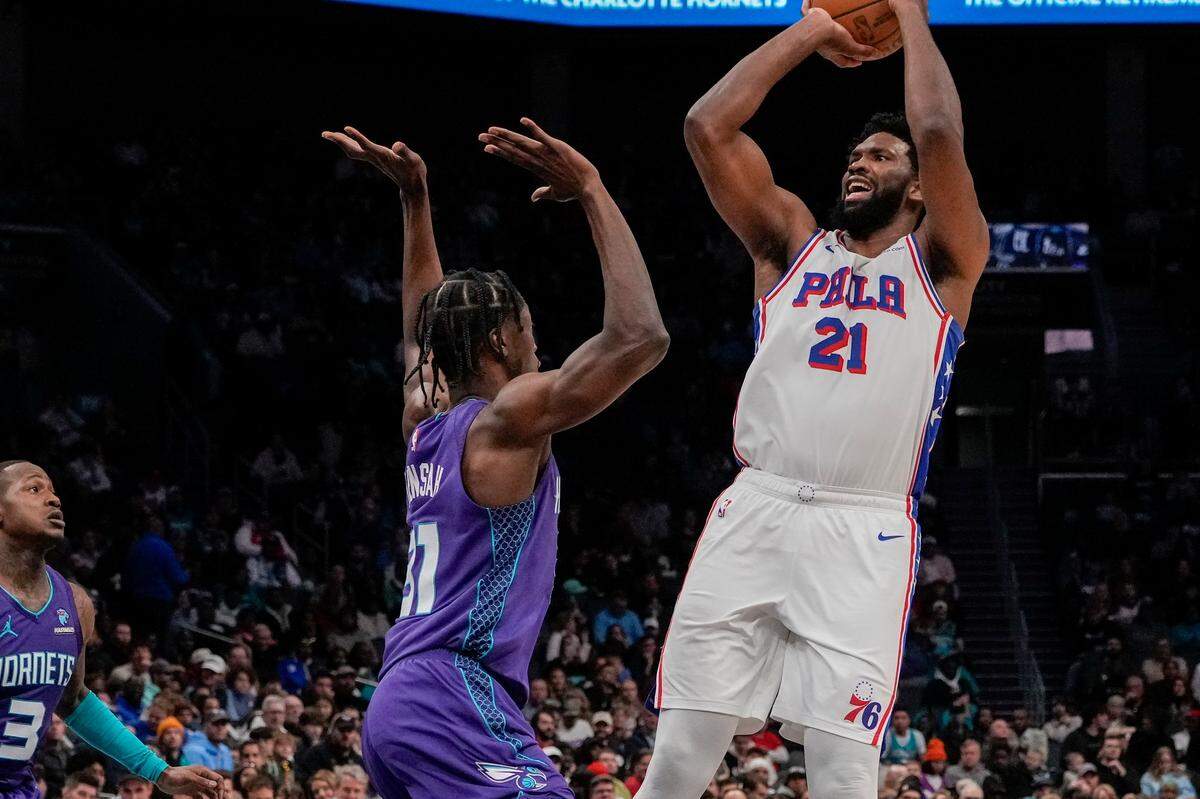 Philadelphia 76ers center Joel Embiid (21) shoots over Charlotte Hornets center Nathan Mensah (31) during the second quarter at Spectrum Center on Jan. 20.