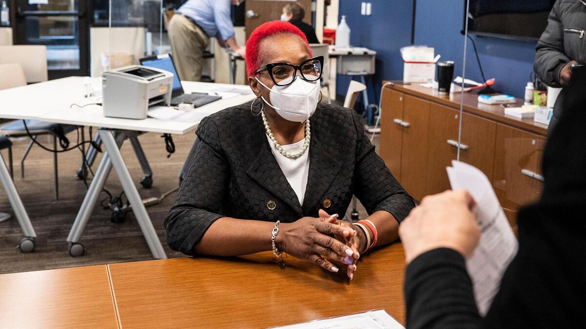 Lucille Puckett, left, completes candidate paperwork to run for Charlotte mayor at the Mecklenburg County Board of Elections on Feb. 24, 2022. This is Puckett’s fourth time as a mayoral candidate. She previously ran in 2013, 2017, 2019 and is making another attempt for 2022.