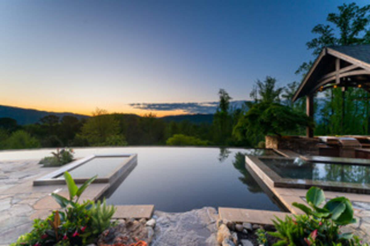 A 50-foot infinity-edge pool and spa complete the resort-like experience.