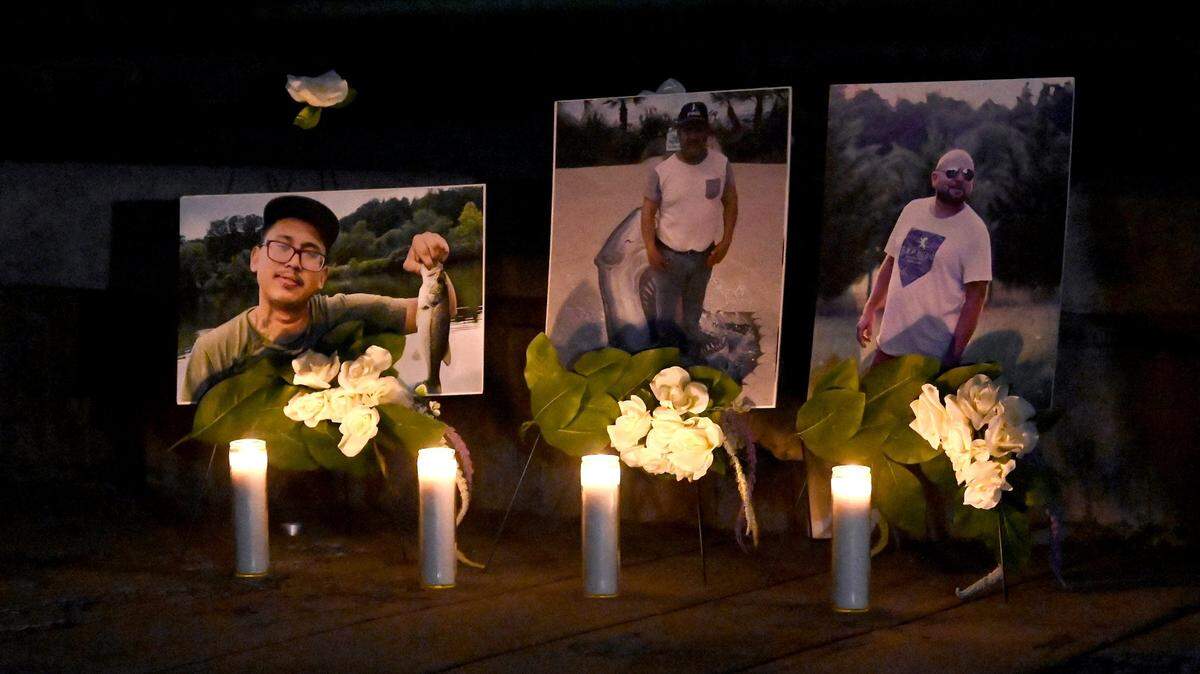 Family and friends gathered on Friday, February 3, 2023 at Marshall Park for a candle light vigil in memory of the three men who died when the construction scaffolding they were working on collapsed in early January 2023.