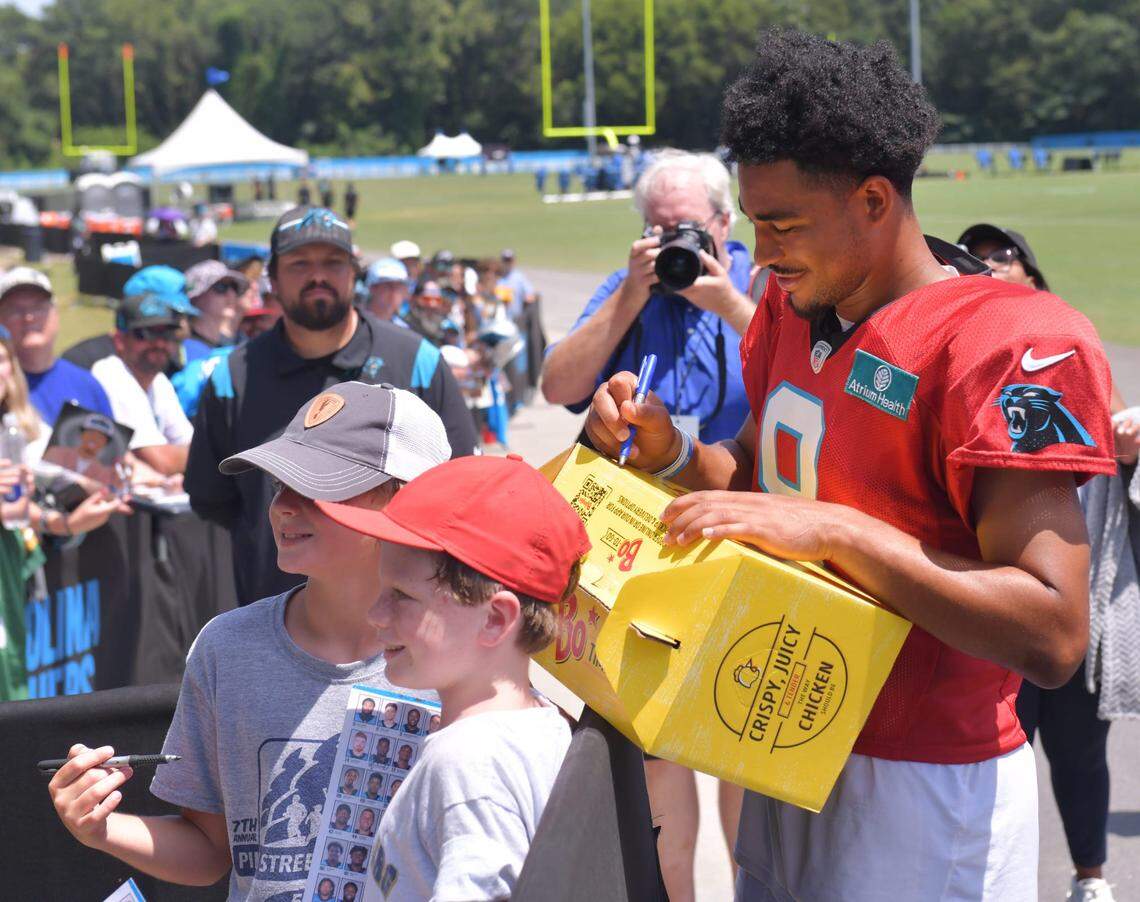 The Carolina Panthers and the New York Jets held a joint training camp practice at Wofford in Spartanburg on Aug. 9, 2023. After practice Carolina Panthers QB Bryce Young (9) signed autographs for fans.