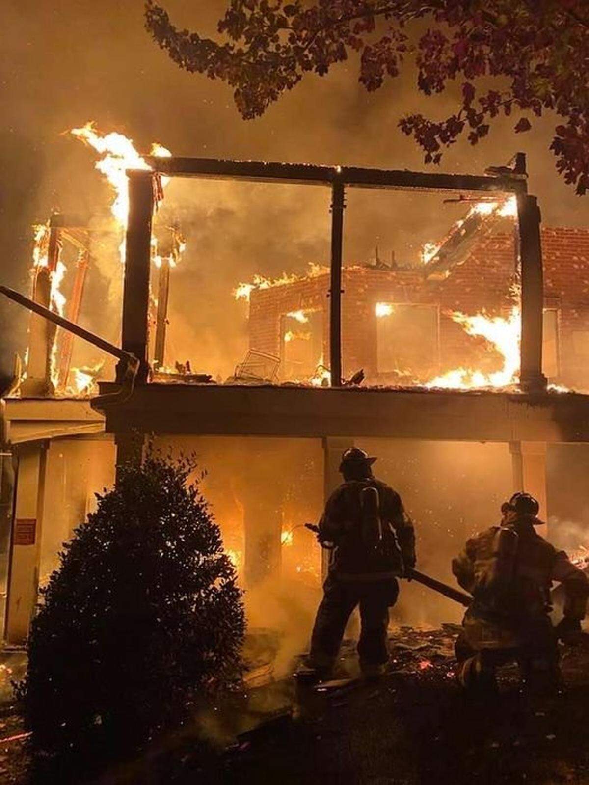 Firefighters fight a fire at Lake Norman in Oct. 2020.