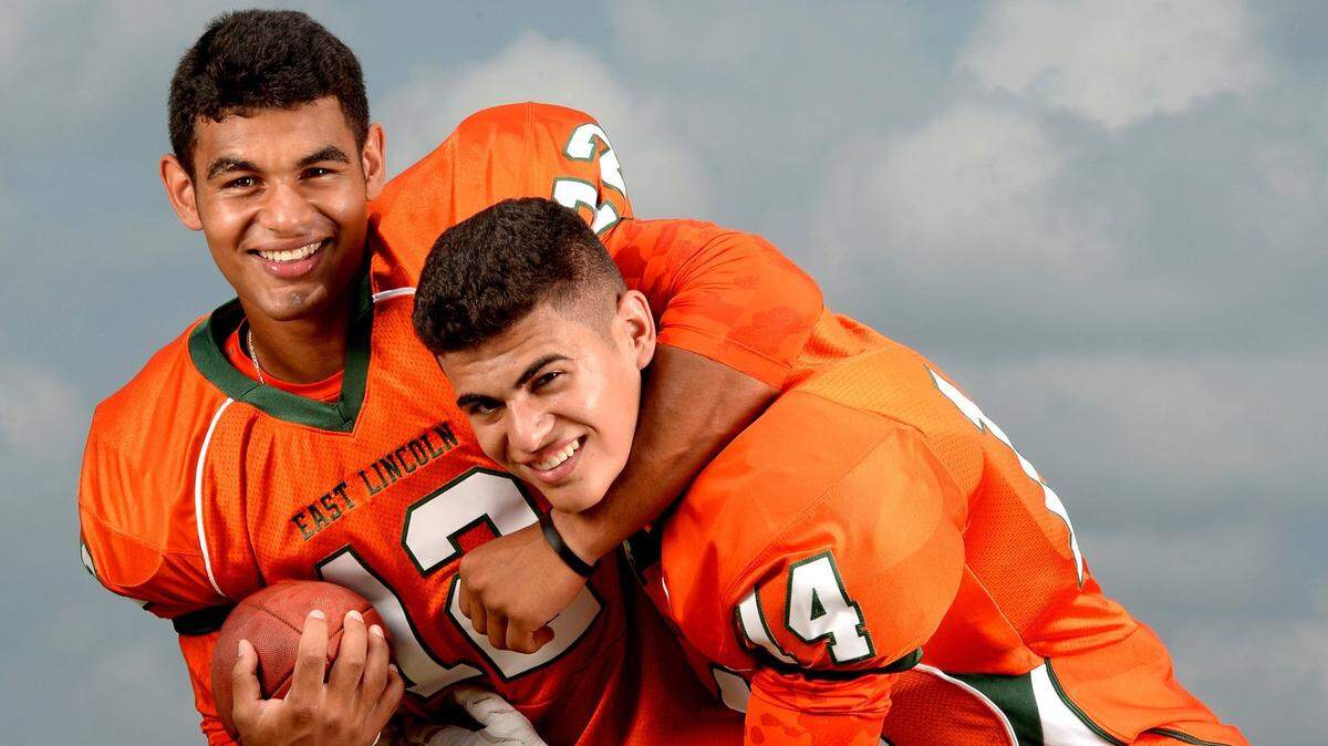 Chazz Surratt, left, and his brother, Sage, won an N.C. state championship for East Lincoln in 2014 with Chazz as quarterback and Sage as his top receiver. In college, Chazz Surratt would switch from quarterback to linebacker at UNC, while Sage Surratt played wide receiver at Wake Forest. Both are eligible for the 2021 NFL draft.