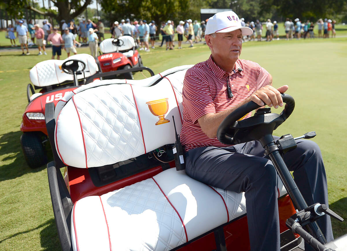 U.S. team captain Davis Love III waits along the 18th green during a practice round at Quail Hollow Club in Charlotte, NC on Tuesday, September 20, 2022. The U.S. team will face the International team in the Presidents Cup that will be held at Quail Hollow Club from September 22-25, 2022.