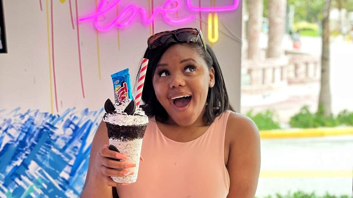 Charlotte food blogger Amber Owens poses at Icy-N-Spicy dessert shop in Miami. We asked her for some of her favorite restaurants to visit on a road trip.