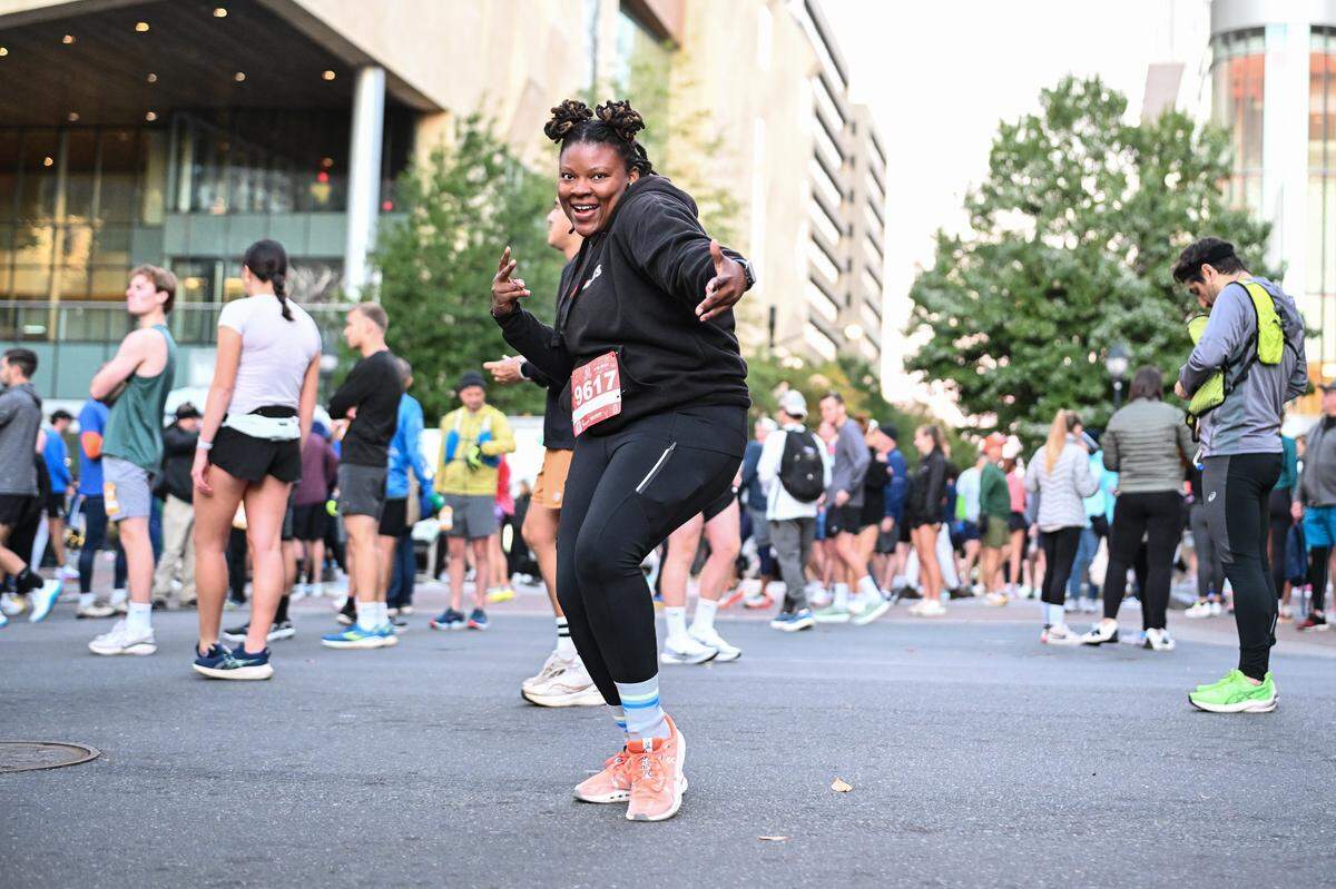 Alison Cherry poses prior to taking part in the 20th annual Novant Health Charlotte Marathon on Saturday, Nov. 16, 2024, in Charlotte