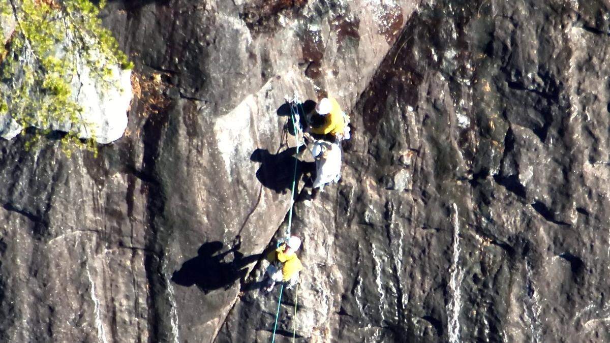 Transylvania County Rescue Chief Christopher Alquiza says the men were stranded from 6:30 p.m. until around 10 a.m. the next morning, and they had intended to “self rescue.” 