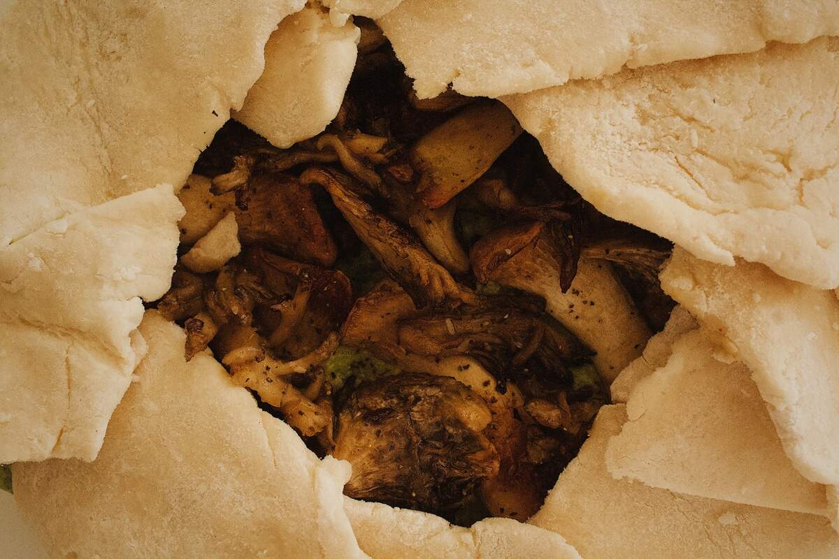 A peppery arugula pesto galette with seared oyster mushrooms.