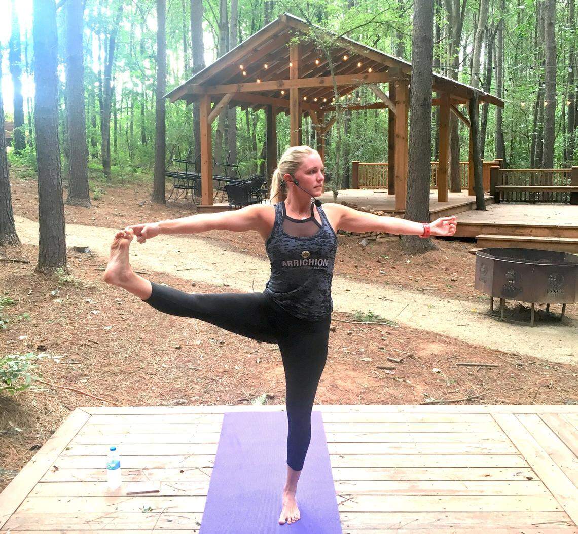 Quinn Burton of Arrichion Hot Yoga teaches a yoga class at the U.S. National Whitewater Center.