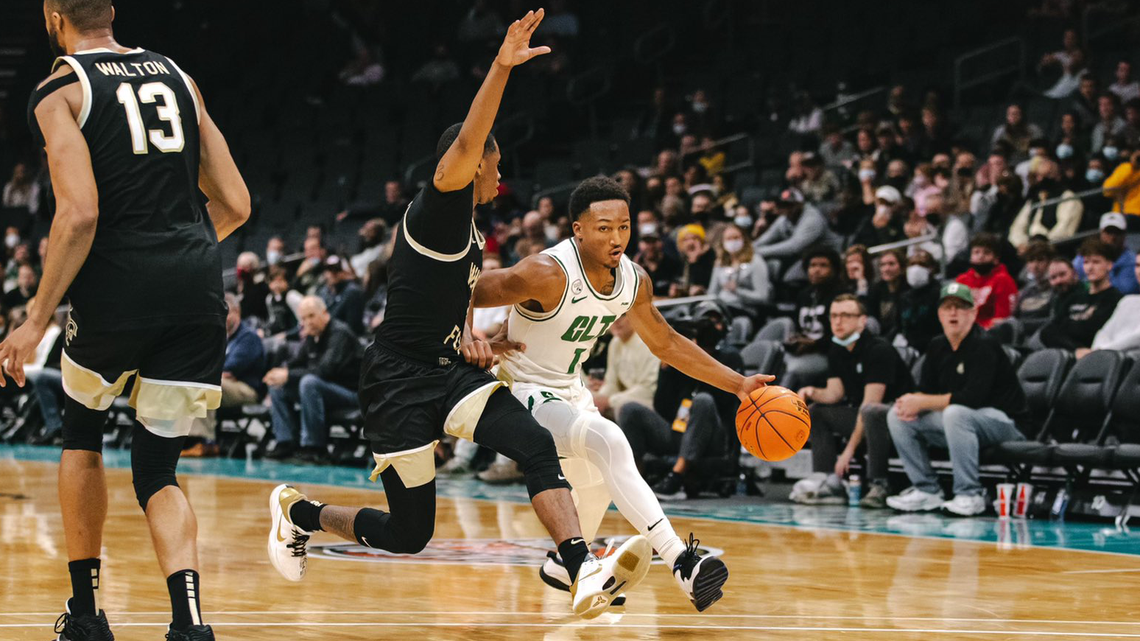 Charlotte 49ers guard Jahmir Young reached the 1,000-point plateau against Wake Forest on Friday, Dec. 17, 2021, but the 49ers lost on a buzzer-beater, 82-79. Young had 27 points in the defeat.