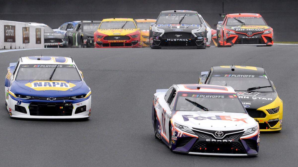 NASCAR driver Denny Hamlin leads drivers Chase Elliott, left and Brad Keselowski, right, into Turn 7 during the Bank of America Roval 400 at Charlotte Motor Speedway in Concord, NC on Sunday, October 11, 2020. Elliott would win the race.