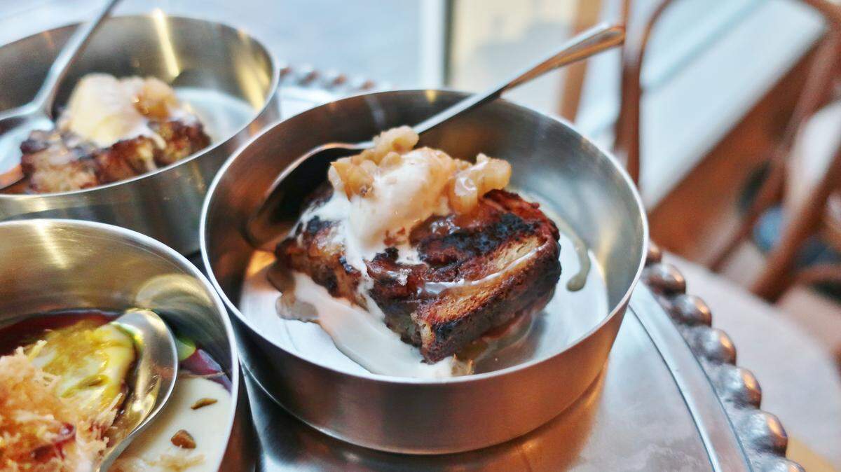 Albertine’s grilled Nutella babka is served with date caramel, Amontillado sherry and labneh ice cream.