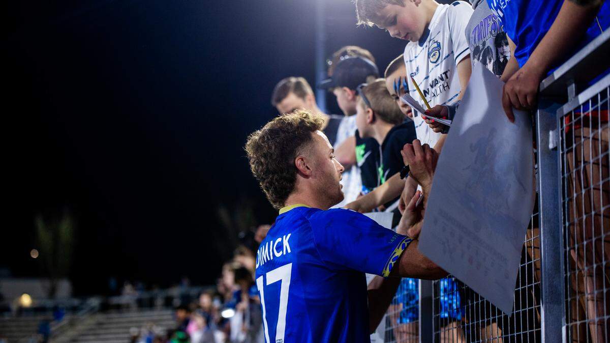 Clay Dimick signs a jersey after Charlotte Independence’s 2-1 loss to One Knoxville SC in its 2024 season opener. Laura Stroud