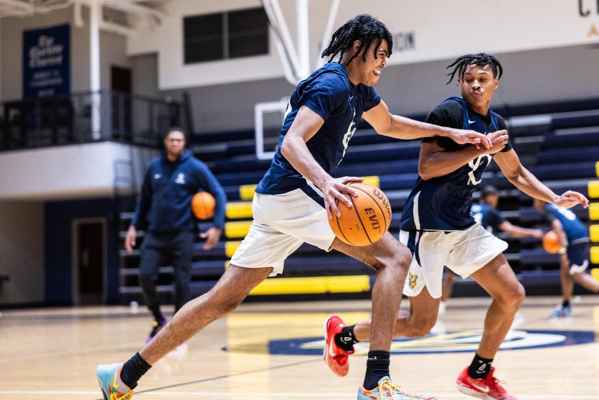 Bryce Slay runs a drill during basketball practice at Carmel Christian in Charlotte, N.C., on Monday, December 16, 2024.
