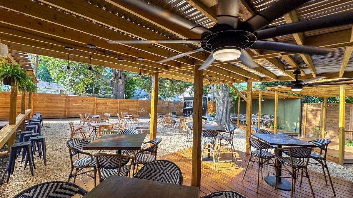 Large fans help cool the patio at The Bottle Tree in Belmont.