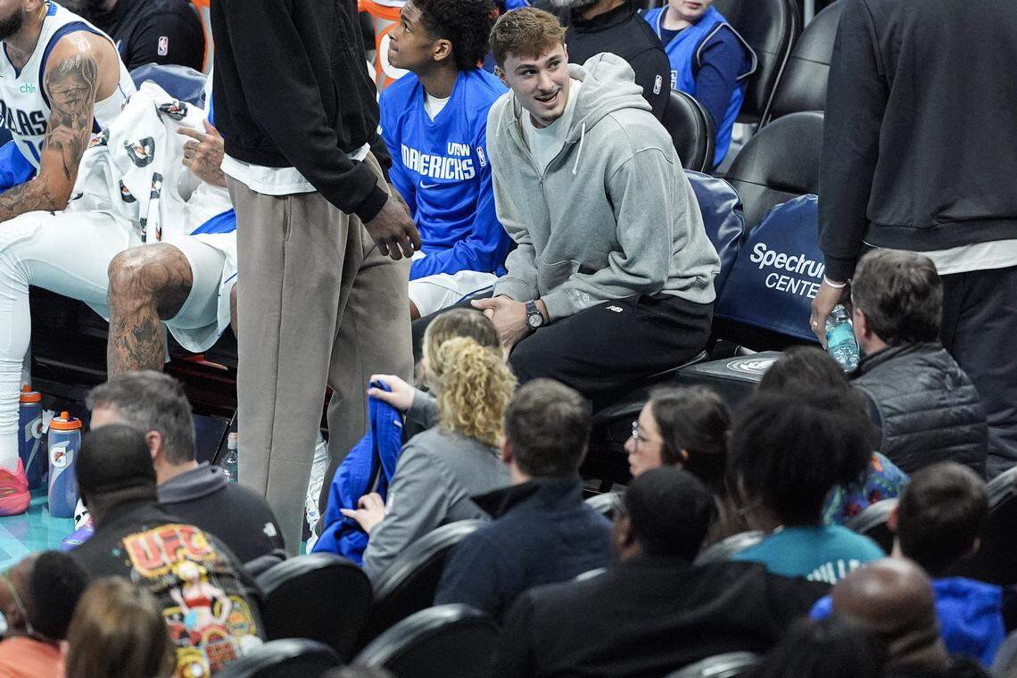 Dallas Mavericks forward Cooper Flagg looks on during the first half of an NBA basketball game against the Charlotte Hornets, Tuesday, March 3, 2026, in Charlotte, N.C. 