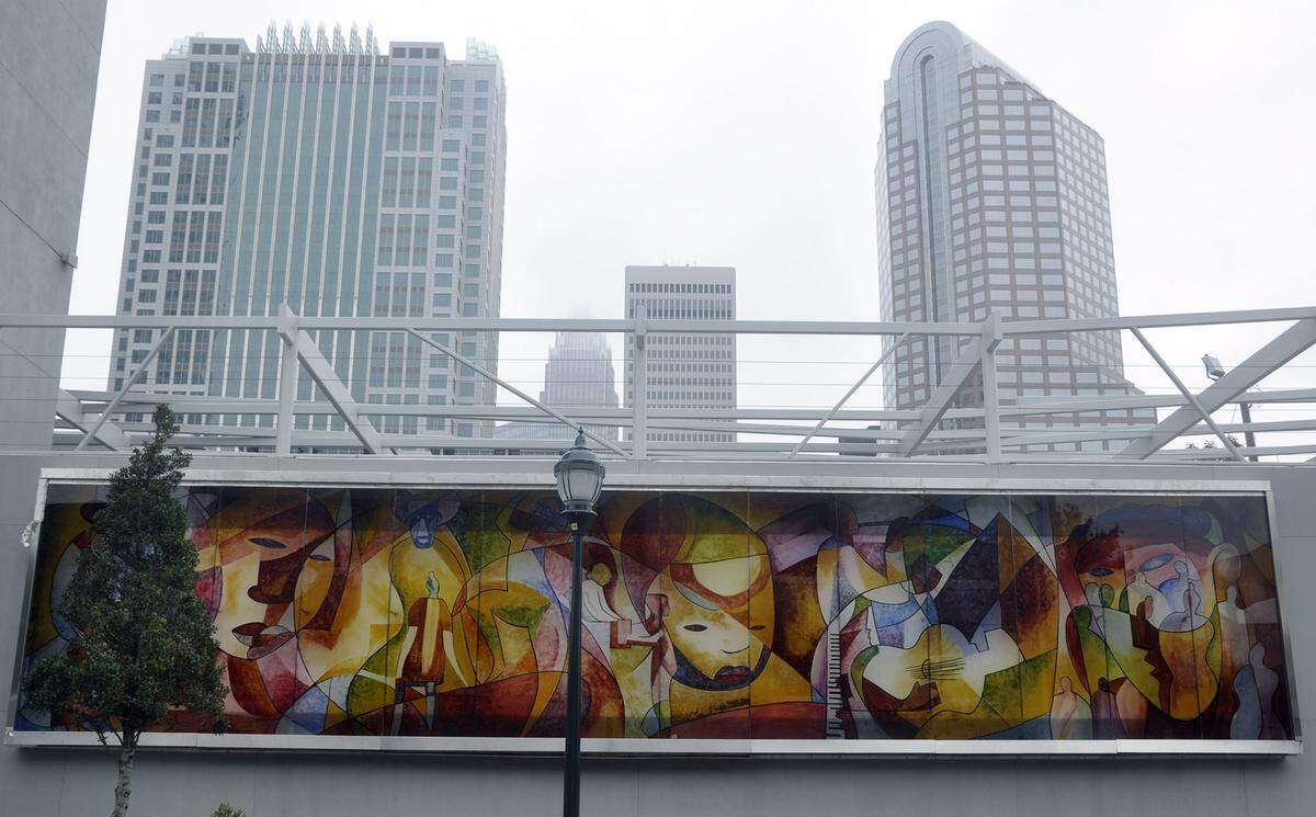 Gantt Center president David Taylor’s favorite piece of Obvious Cool art is this glass mural outside the Gantt Center.  “Divergent Threads, Lucent Memories” is by Apex, NC artist David Wilson.