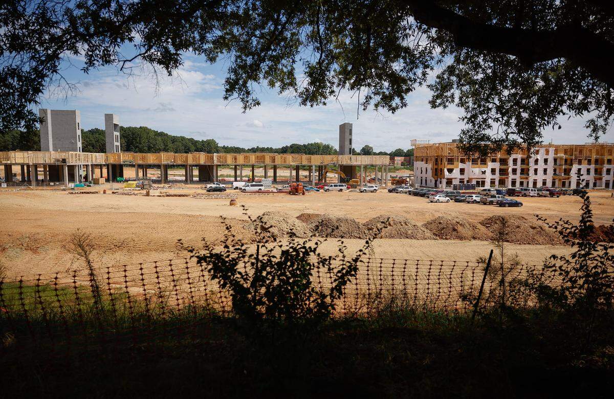 This 2024 file photo shows construction on apartments that have since opened on the former site of Eastland Mall along Central Avenue. 