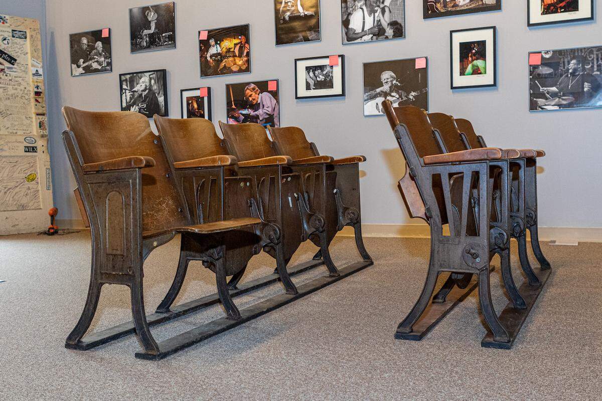 Seats from Double Door Inn are on display at The Charlotte Museum of History in the “Unforgettable Music Venues of Charlotte” exhibit.