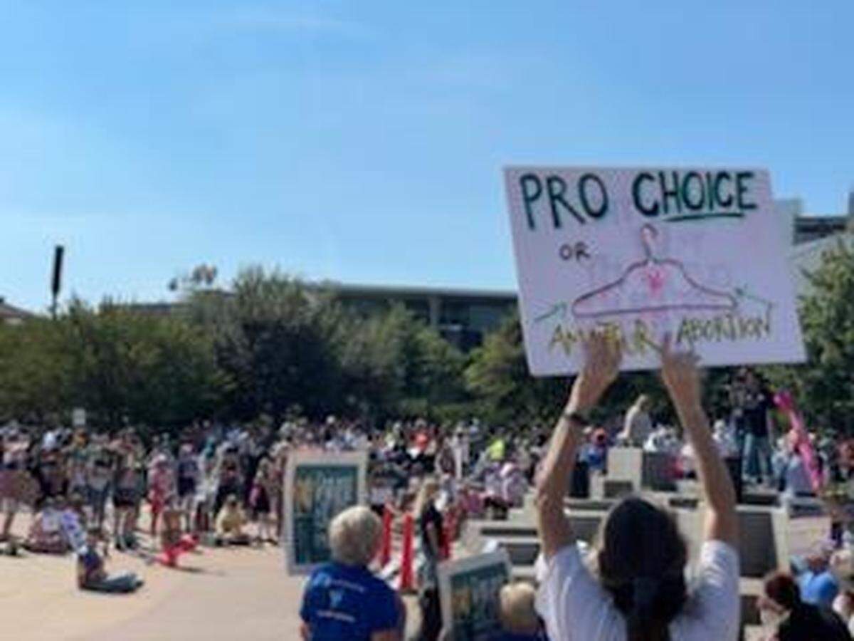 About 400 residents gathered Saturday in First Ward Park in uptown Charlotte to protest restrictive anti-abortion laws in Texas.