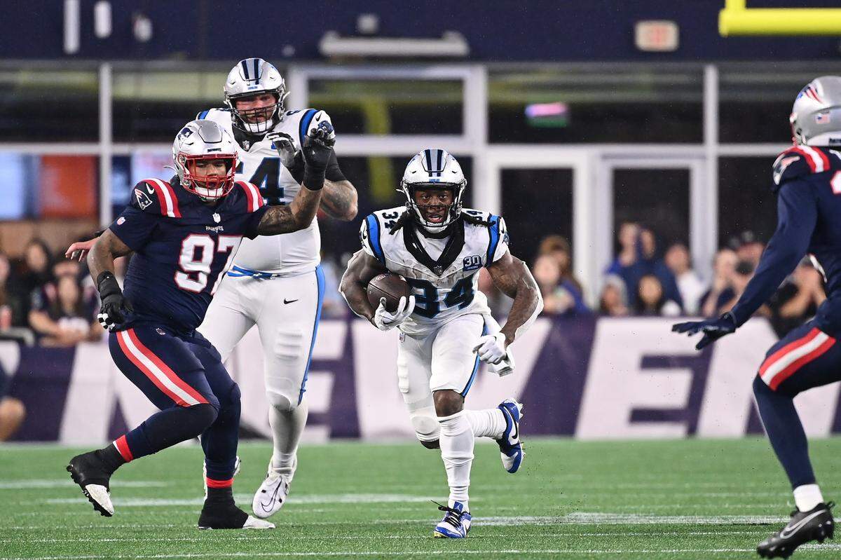 Carolina Panthers running back Mike Boone (34) runs the all during the first half against the New England Patriots at Gillette Stadium.