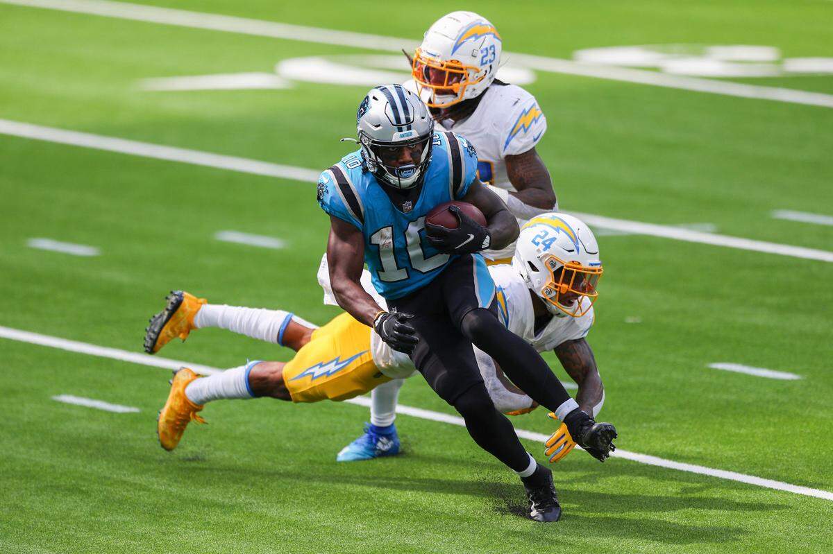 Carolina Panthers wide receiver Curtis Samuel (10) avoids a tackle against the L.A. Chargers on Sept. 27, 2020.
