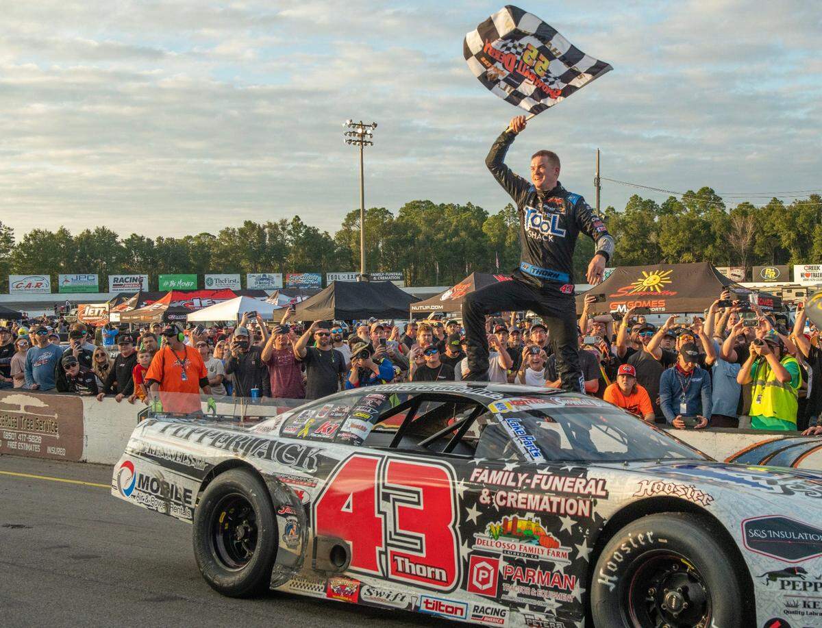 Derek Thorn celebrates after winning the 55th annual Snowball Derby at Five Flags Speedway Sunday, December 4, 2022. Snowball Derby 2022 1