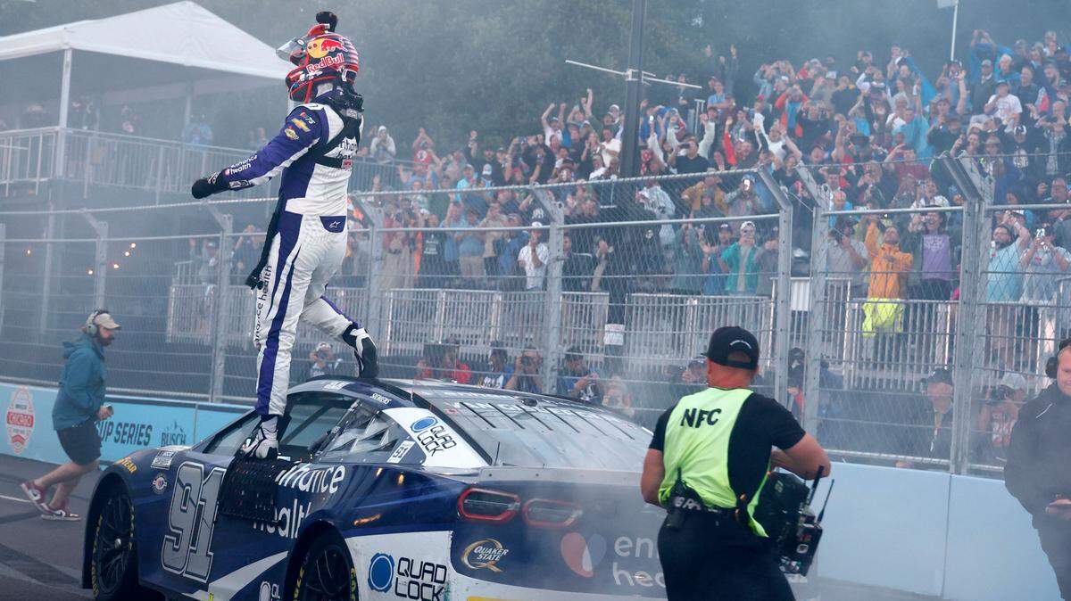 NASCAR Cup Series driver Shane Van Gisbergen (91) reacts after winning the Grant Park 220 of the Chicago Street Race at Chicago Street Race.