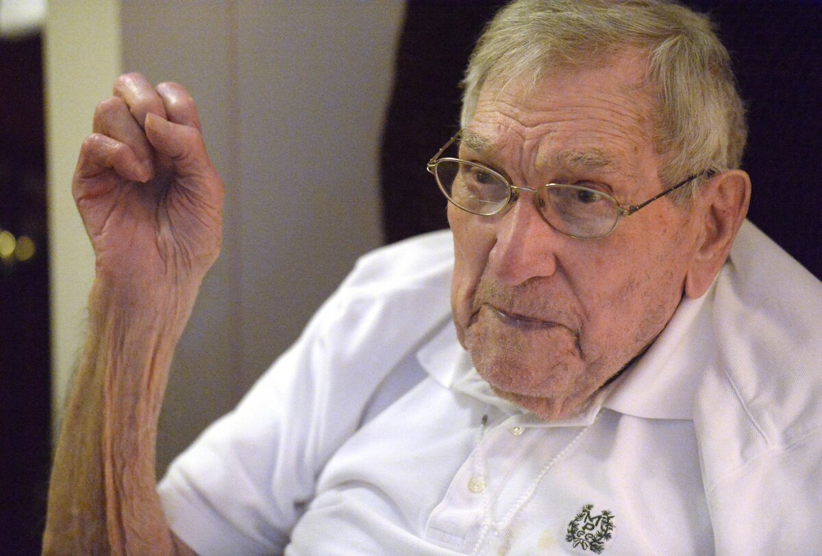 Fred Caligiuri, 99, demonstrates a pitching grip during his time in the MLB with the Philadelphia Athletics.