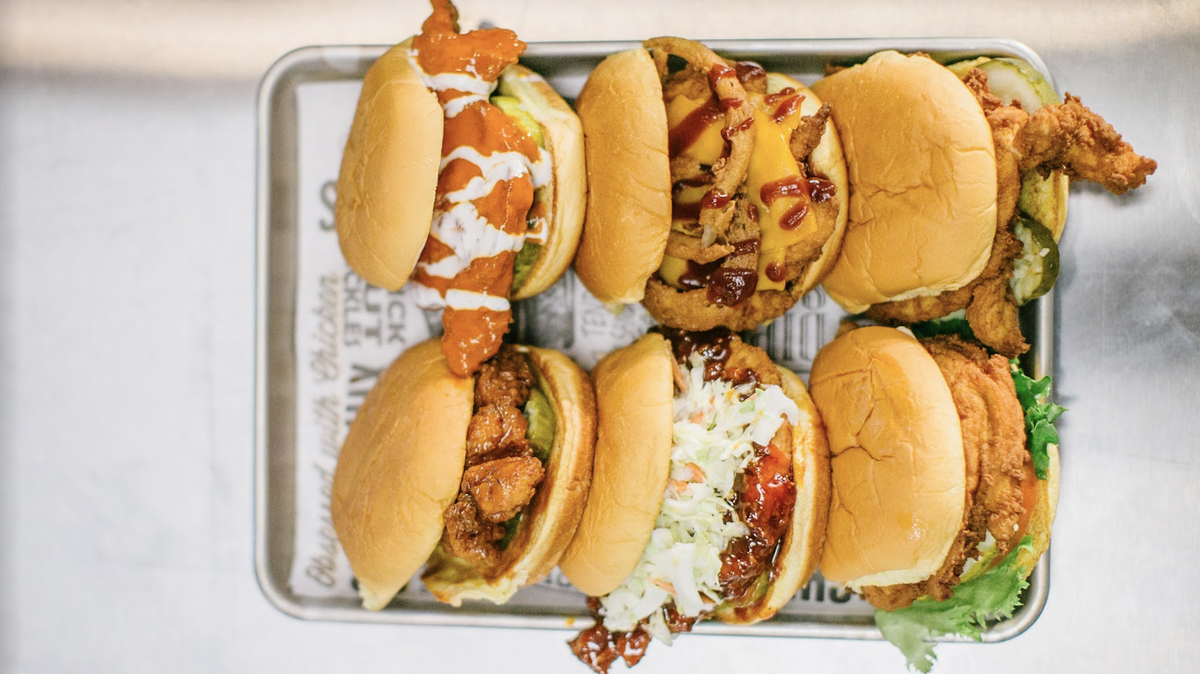 The Simple at Super Chix comes with a chicken filet and kosher pickles on a butter-toasted potato bun. Other options include Cheesy BBQ, Buffalo Ranch, Korean BBQ and more.