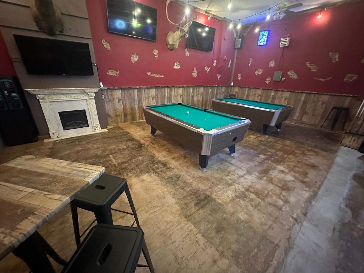Two Buck Saloon offers two pool tables.