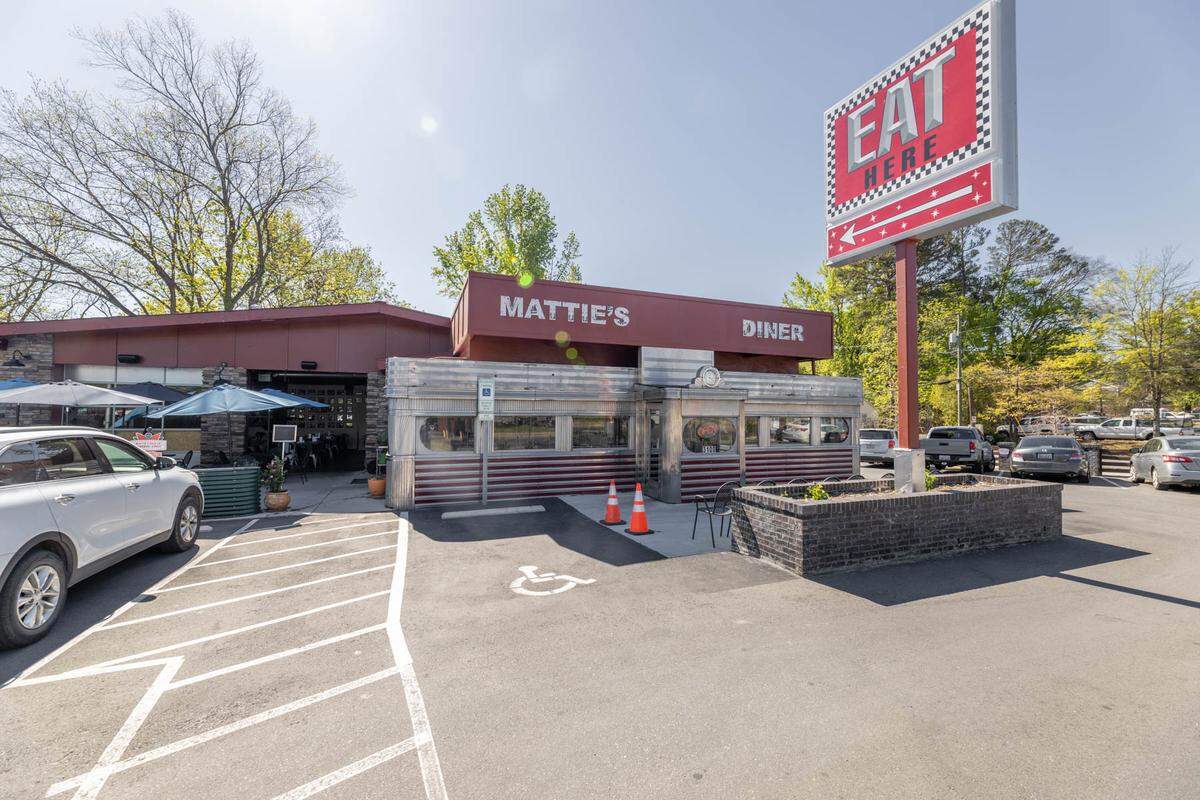The 1940s diner car that was Mattie’s Diner was moved to the new location and incorporated into the property’s existing building (a former Tire Depot)
