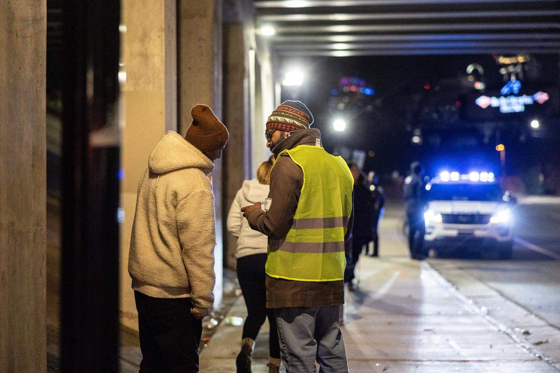 Jeet Pawar, right, surveys an unhoused person during the 2026 Point-in-Time Count in Charlotte, N.C., on Thursday, January 22, 2026.