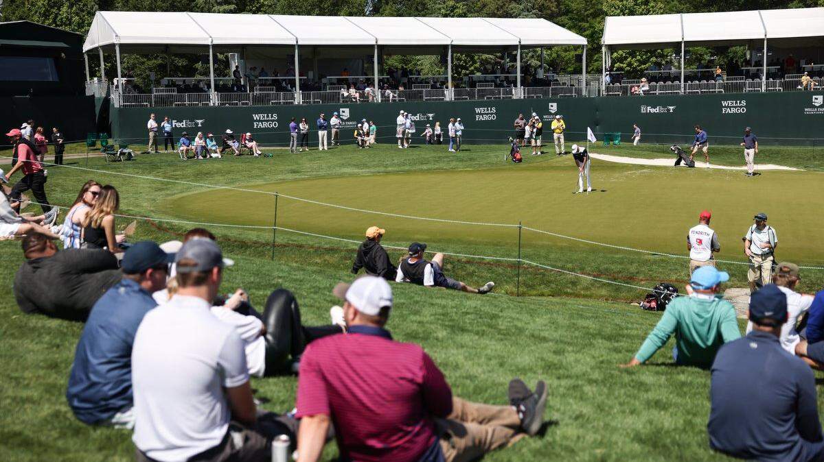 Fans gather at Quail Hollow Club in Charlotte to watch the Wells Fargo Championship Pro-Am in Charlotte, N.C., on Wednesday, May 3, 2023.