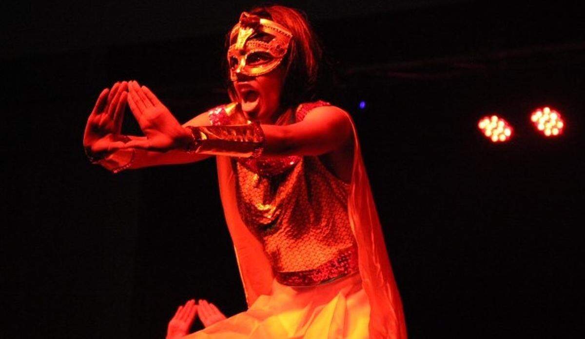 A member of Delta Sigma Theta Sorority performs during a CIAA step show.