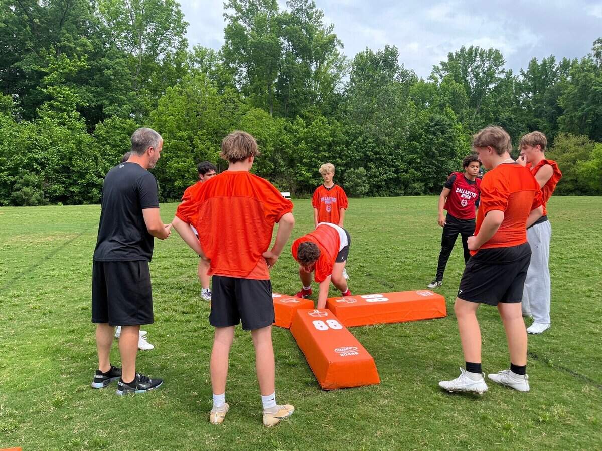 Spring football practice takes place at the Morrison Family YMCA. A protest for the sale of the facility and grounds is scheduled for July 12.