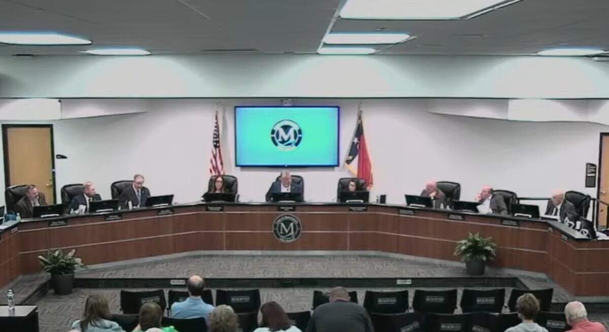 The Mooresville Board of Commissioners is shown voting on the proposed Williamson Road Townhomes project on Monday, June 1.