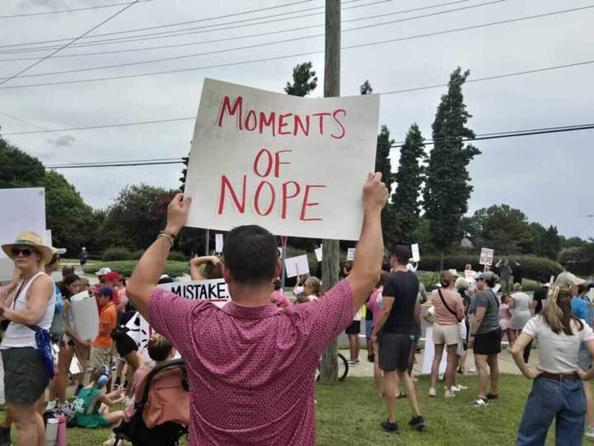 Hundreds of people gathered on Sunday in south Charlotte to protest the sale of the Morrison Family YMCA to a church.