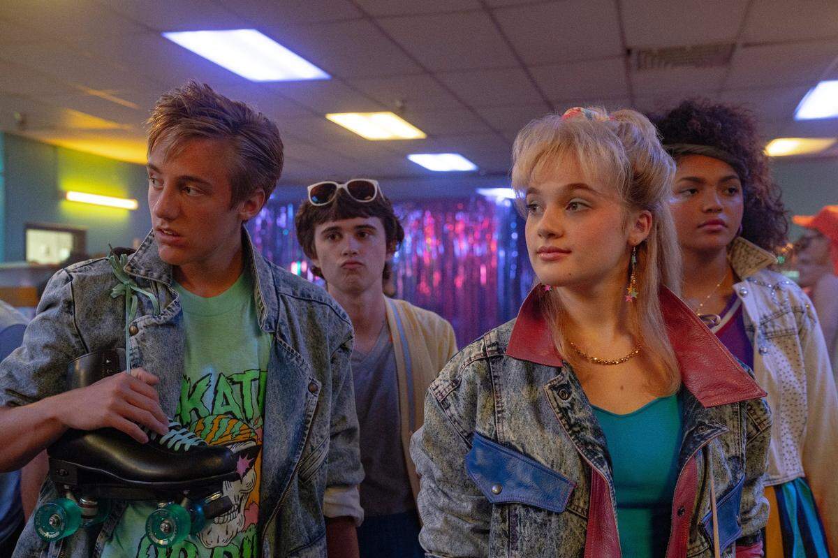 Angela (Elodie Grace Orkin) along with her friends showcase ’80s fashion at its finest.