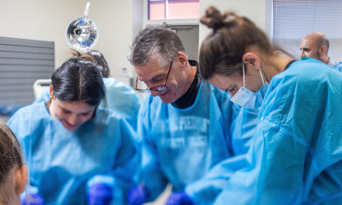 Dissection Club participants work together during a session at Experience Anatomy.