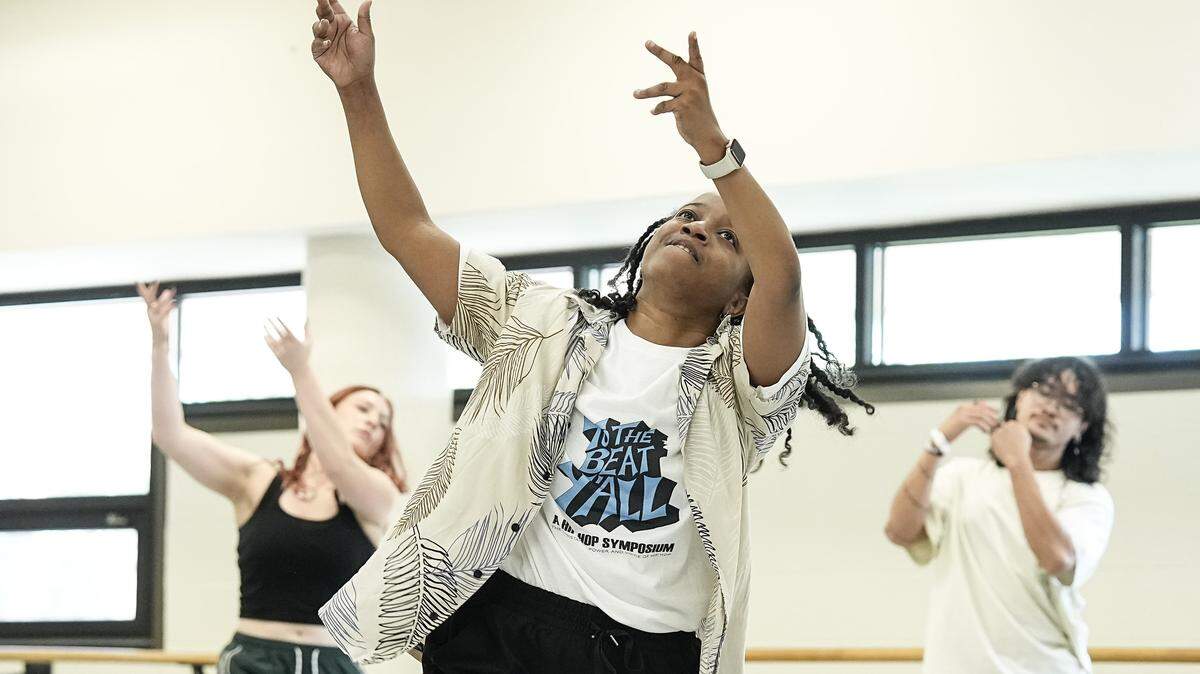 Assistant professor of dance Ashley Tate, center, teaches a dance routine ahead of the hip hop symposium she is producing at UNC Charlotte, Wednesday, Sept. 24, 2025, in Charlotte, N.C.