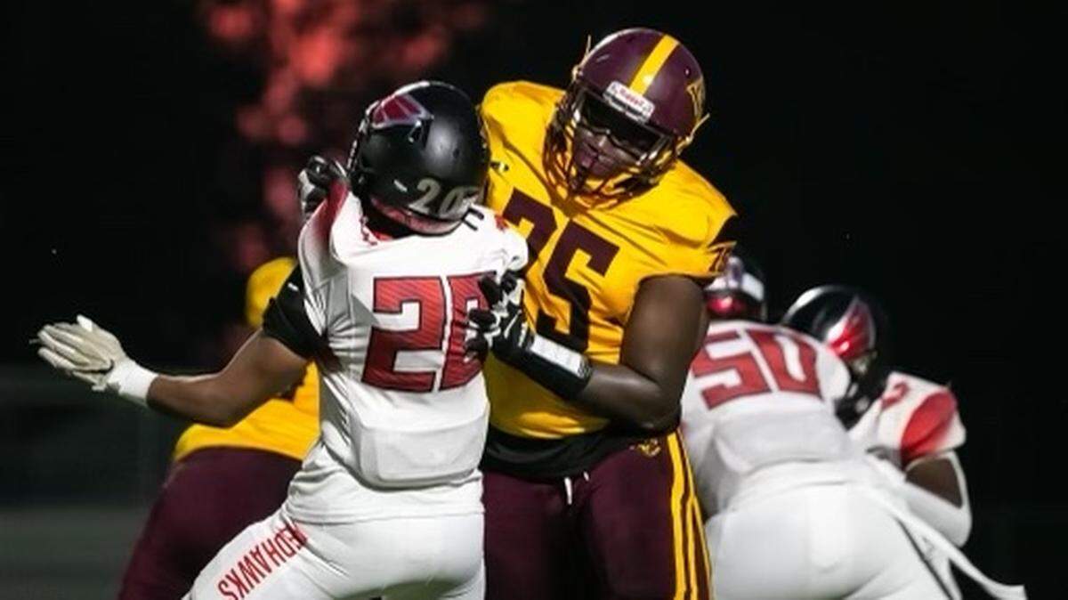 West Charlotte Sean Holloway blocks Monroe’s Yoel Deleon