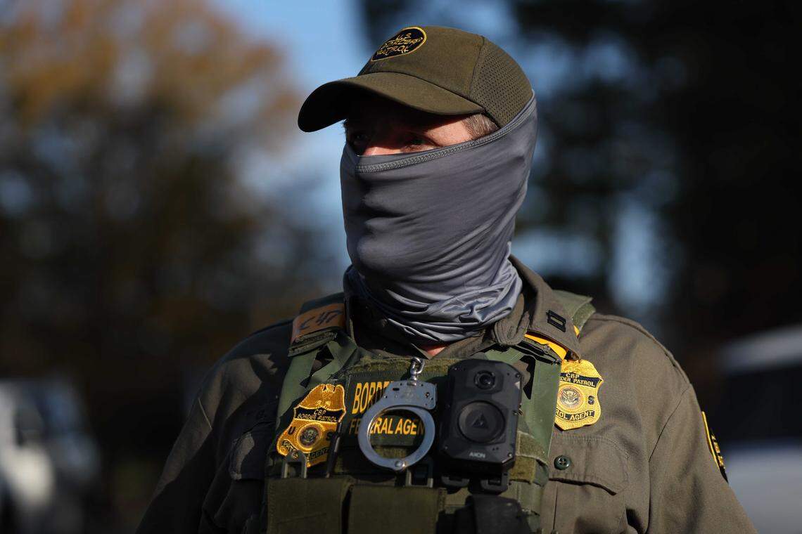 A Border Patrol agents on Sharonbrook Drive in Charlotte, NC on Sunday morning. At 9 a.m. Sunday, Border Patrol officials said on X they had “taken off the streets” 81 people in five hours, apparently a reference to Saturday activities.