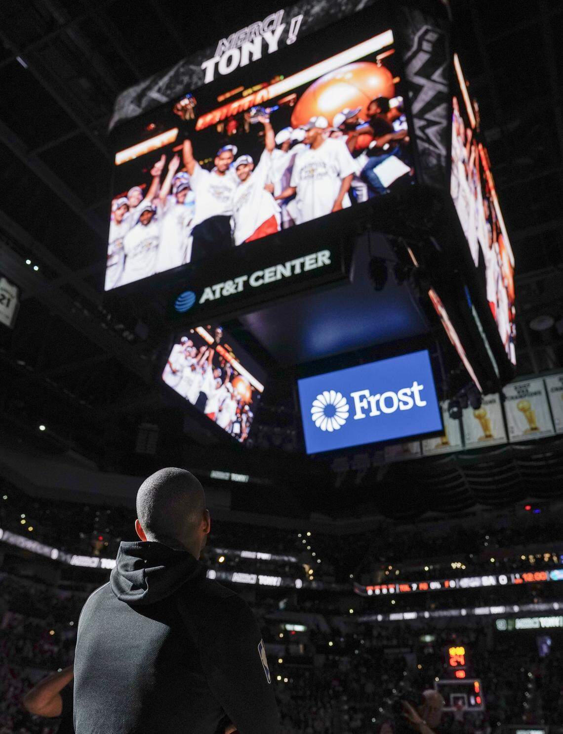 Charlotte Hornets guard Tony Parker watches a tribute video made for him by the San Antonio Spurs before Monday’s game between the teams in San Antonio. Charlotte won 108-93. Parker played for San Antonio from 2001 to 2018, winning four NBA Championships.