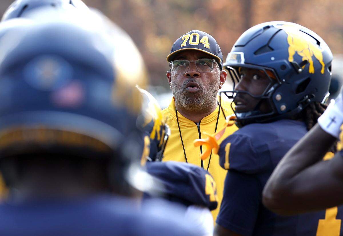 Johnson C. Smith University Golden Bulls head coach Maurice Flowers brings the team together prior to action against Frostburg State at the Irwin Belk Complex in Charlotte, NC on Saturday, November 22, 2025. 