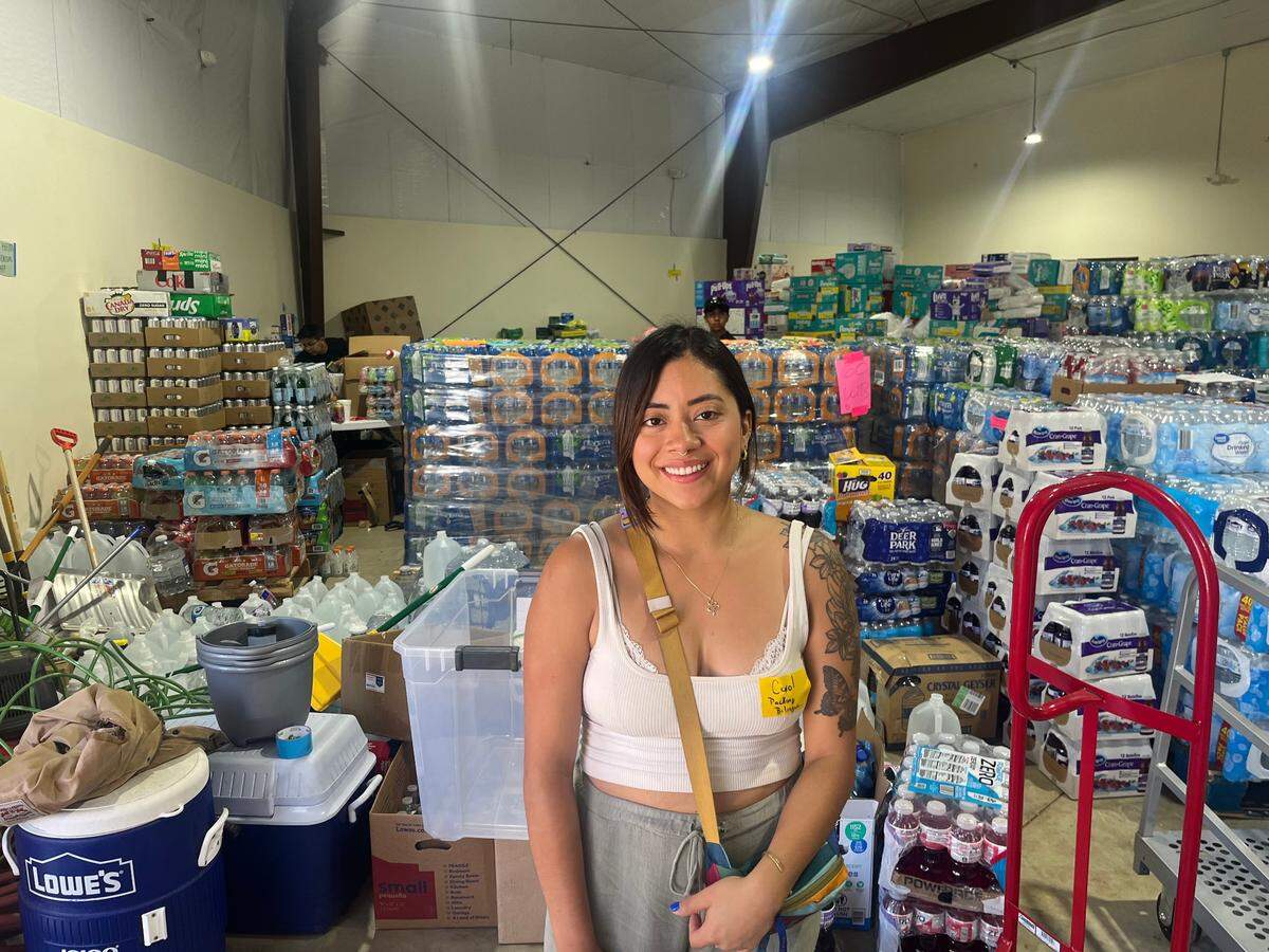 Carol Alcantar helped deliver supplies to people in Emma on Saturday, Oct. 5, 2024.