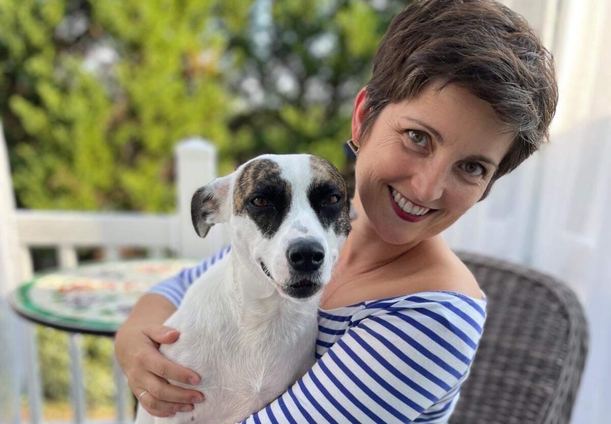 Jenny Van Stone and her dog, Sophie, are taking the leap and leaving Charlotte for Paris.