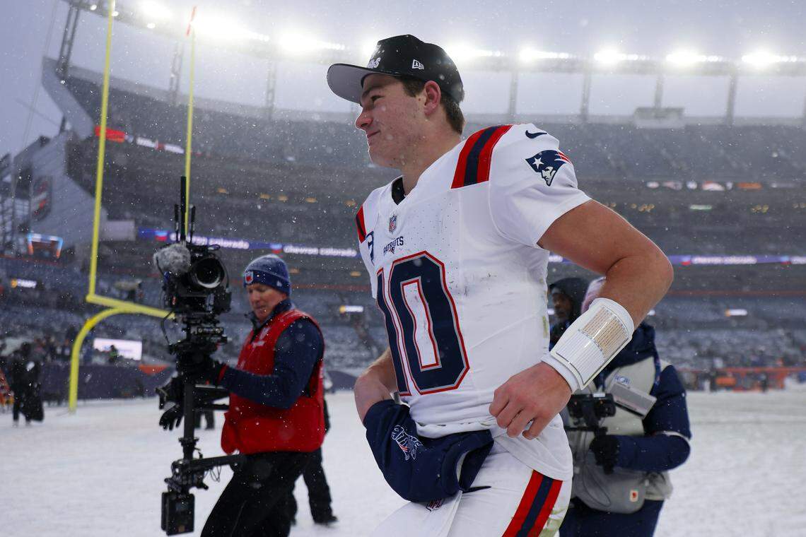 Drake Maye of the New England Patriots runs off the field after defeating the Denver Broncos in the AFC Championship Playoff game at Empower Field At Mile High on Jan. 25, 2026, in Denver, Colorado. The Patriots advanced to the Super Bowl with the win.