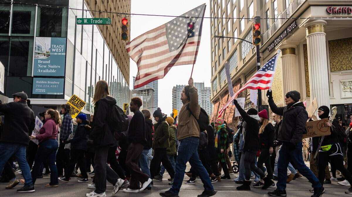 Protesters march during the ICE OUT Charlotte: Stand with Minnesota Rally in Charlotte, N.C., on Friday, January 30, 2026.
