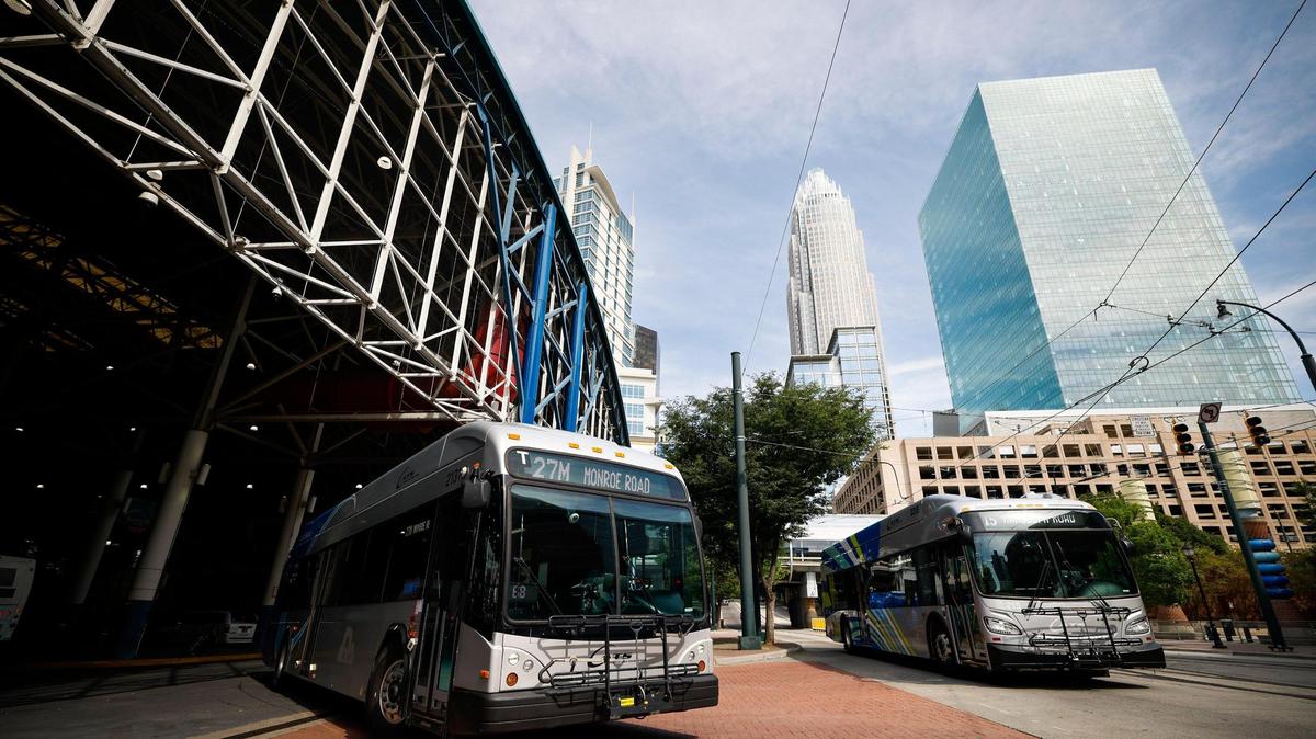 Two CATS busses leave the Charlotte Transportation Center on East Trade Street in Charlotte, N.C., Tuesday, July 12, 2022. CATS is currently facing a bus driver shortage which has been affecting commuters.